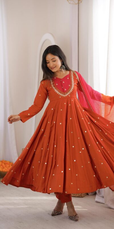 ZF 5023 Rust Roman Silk Gown with Mirror Work & Embroidery Work. Special Price ₹2099. Delivery 4-6 Working Days. Shop now. | Gowns, Bollywood Gowns, Creative Gowns, Designer Gowns, Embroidered Gowns, Party Wear Gowns