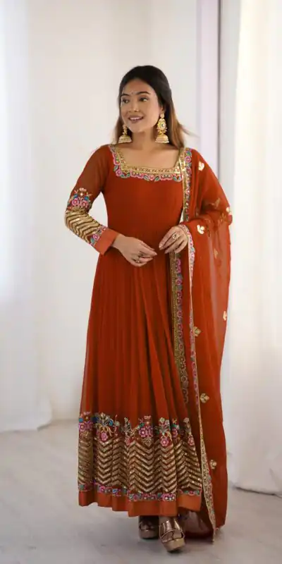 Rust Georgette Multi Thread Work Gown | Jump Suits, Salwar suit, Casual Suits, Creative suits, Designer Suits, Palazzo Suits, Party Wear Suits, Patiala Suits, Straight Suits