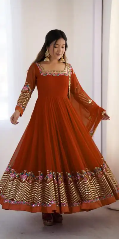 Rust Georgette Multi Thread Work Gown | Jump Suits, Salwar suit, Casual Suits, Creative suits, Designer Suits, Palazzo Suits, Party Wear Suits, Patiala Suits, Straight Suits