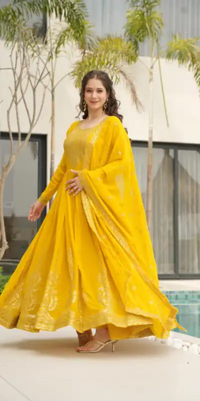 Yellow Faux Blooming Sequins Zari Gown | Gowns, Bollywood Gowns, Creative Gowns, Designer Gowns, Embroidered Gowns, Party Wear Gowns