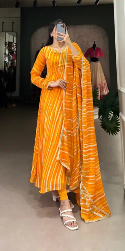 Yellow Georgette Leheriya Gown | Gowns, Bollywood Gowns, Creative Gowns, Designer Gowns, Embroidered Gowns, Party Wear Gowns