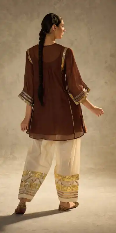 ST 1169 Rust Color Chinon Salwar Suit with Gotta Patti Work. Available at ₹1849 only. Delivery 4-6 Working Days. Shop now. | Jump Suits, Salwar suit, Casual Suits, Creative suits, Designer Suits, Palazzo Suits, Party Wear Suits, Patiala Suits, Straight Suits