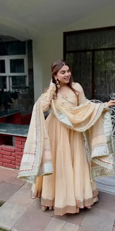 RTC 6048 Cream Tabby Organza Silk Gown with Hand Work & Mirror Work. Special Price ₹2549. Delivery 4-6 Working Days. Shop now. | Gowns, Bollywood Gowns, Creative Gowns, Designer Gowns, Embroidered Gowns, Party Wear Gowns