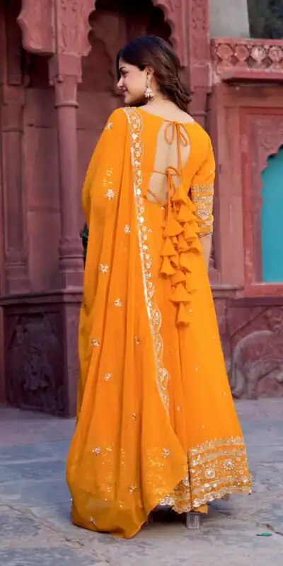 SP 23 Yellow Faux Georgette Gown with Mirror Work & Embroidery Work. Get it for ₹2299. Delivery 4-6 Working Days. Online Shop now. | Gowns, Bollywood Gowns, Creative Gowns, Designer Gowns, Embroidered Gowns, Party Wear Gowns